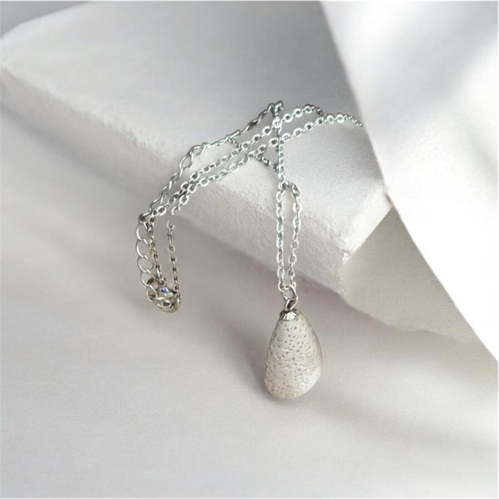 Vintage Avon White Porous Stone Pendant Necklace Silver Tone 22” NIB